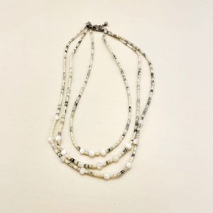 White Multi Strand Bead Necklace